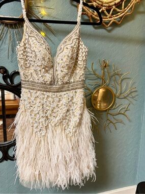 jovani 03023 sheer embellished bodice feather prom dress Jovani 03023 Sheer Embellished Bodice Feather Dress